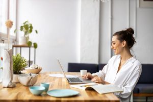 woman looking at laptop