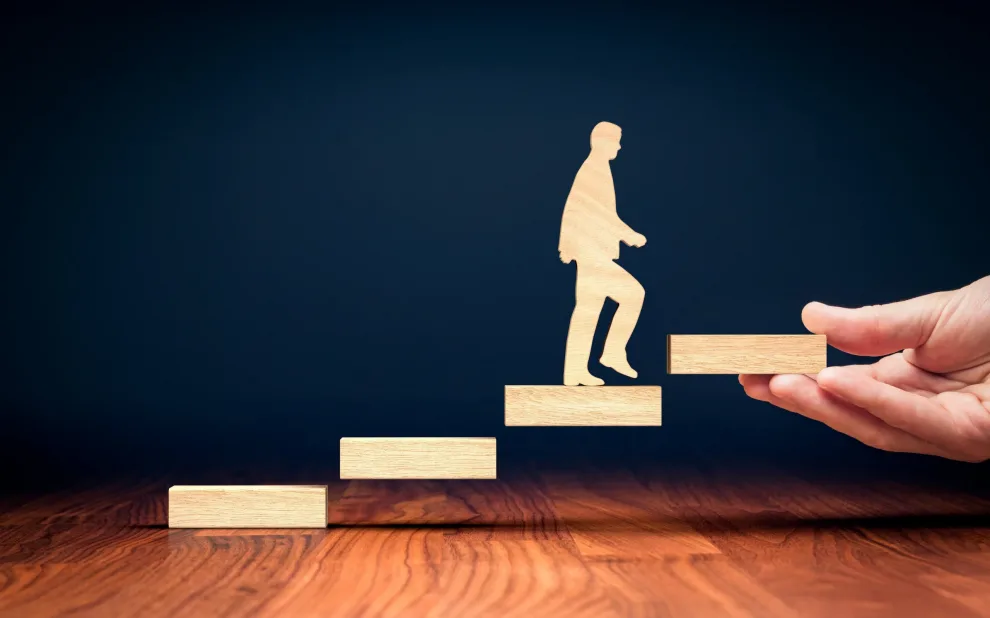 qualified-solar-appointments man stepping up wood blocks