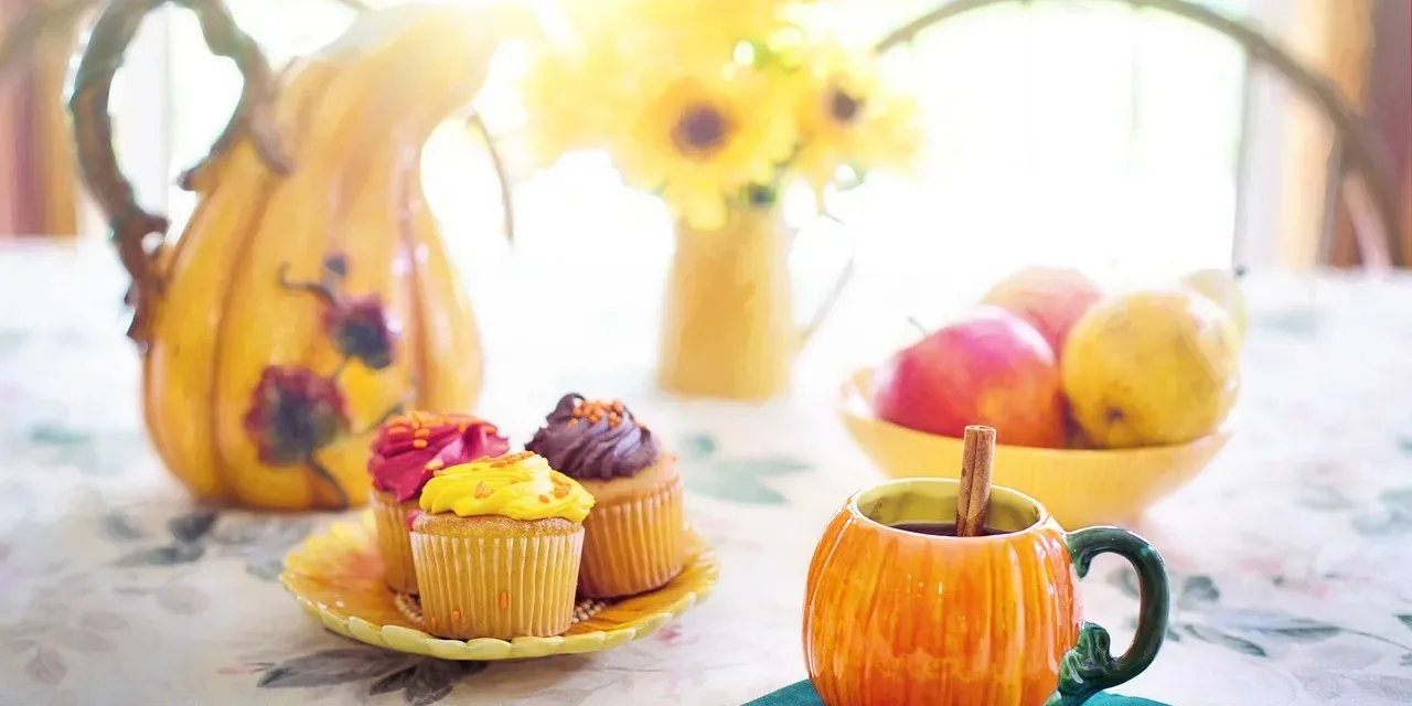 table with cupcakes and fruit